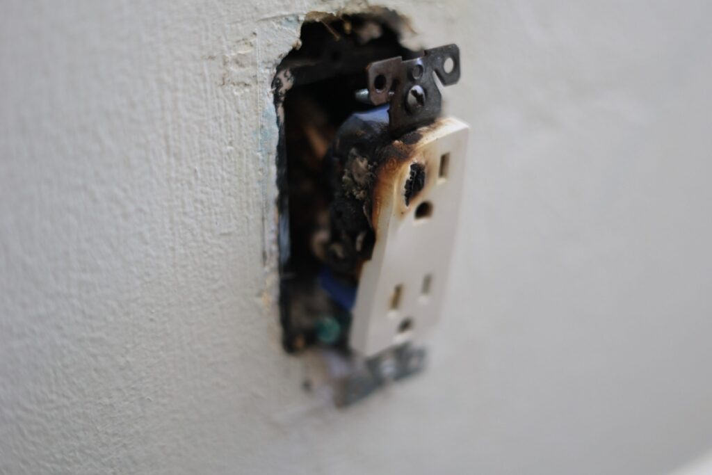 a burnt outlet from an electrical fire